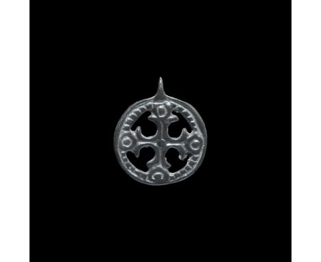 Viking Silver Openwork Cross Pendant 9th-12th century AD. An openwork disc pendant with integral loop above, pelletted border