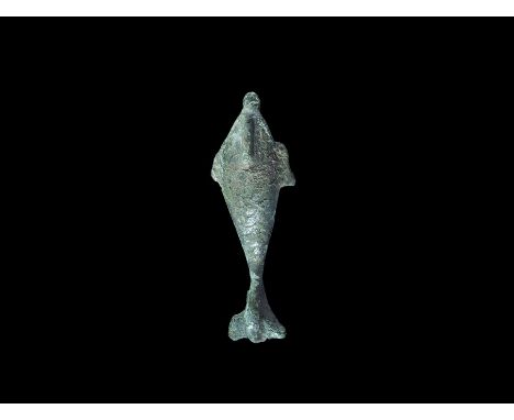 Roman Silvered Bronze Dolphin Brooch 2nd century AD. A D-section dolphin with dorsal and lateral fins, silver scale detail to