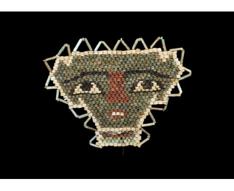 Egyptian Glazed Composition Mummy Bead Mask Ptolemaic Period, 332-30 BC. A restrung panel of small glazed composition beads i