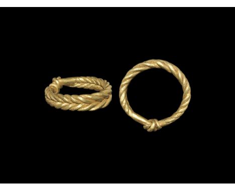 Viking Gold Double-Twist 'Magic' Ring 9th-11th century AD. A broad hoop formed as a herringbone plait of round-section taperi