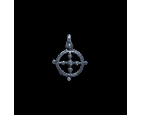 Viking Silver Openwork Cross Pendant 10th-12th century AD. A C-section ring with four radiating balustered arms, suspension r