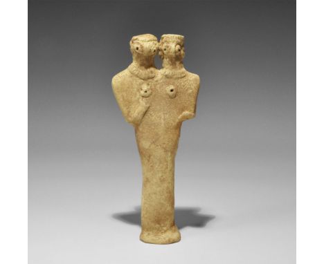 Western Asiatic Syro-Hittite Ceramic Idol 1180-700 BC. A flat-backed ceramic figurine depicting a female with two heads; the 