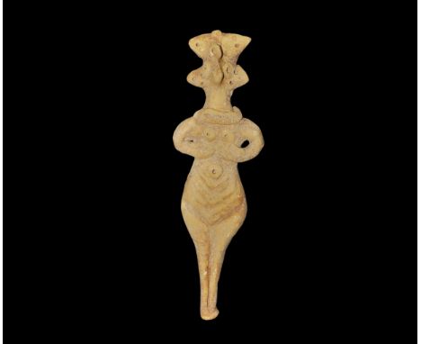 Western Asiatic Syro-Hittite Ceramic Idol 1180-700 BC. A ceramic idol figurine with lozengiform lower body rising to flat-sec