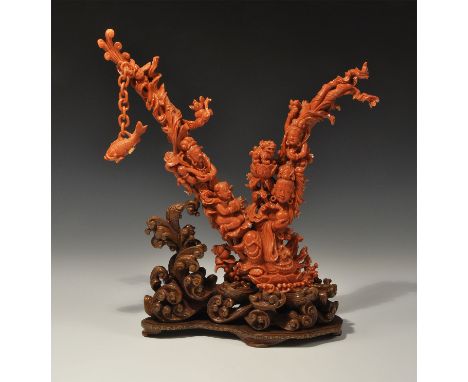 Chinese Coral Carving with Youthful Figures Qing Dynasty, 19th century AD. A large and finely carved double-armed red coral b