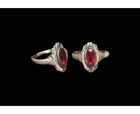 post Medieval Tudor Silver Ring with Elliptical Amethyst Cabochon 16th century AD. A D-section hoop with raised pad to the un