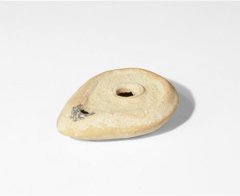 Byzantine Ceramic Oil Lamp with Standing Figures 6th century AD. A small teardrop terracotta lamp with raised rim to the disc