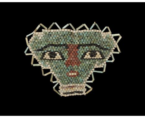 Egyptian Glazed Composition Mummy Bead Mask Ptolemaic Period, 332-30 BC. A restrung panel of small glazed composition beads i