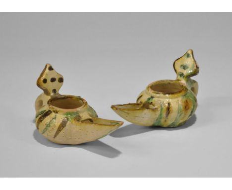 Islamic Glazed Ceramic Oil Lamp Pair 10th-11th century AD. A matched pair of glazed ceramic lamps, each with squat body. D-se