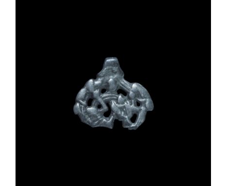 Viking Silver Pendant with Gripping Beasts 10th century AD. A flat-section openwork pendant with integral suspension loop, gr