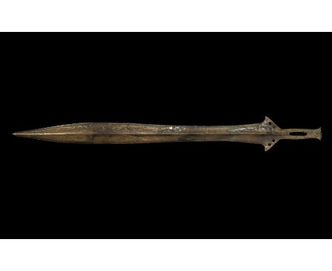 Bronze Age 'St Nazaire' Type Sword 1100-1000 BC. A slender leaf-shaped waisted blade with two sets of four parallel lines eng