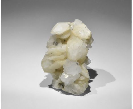 Geological Nail Head Calcite Mineral Specimen A specimen of nail head calcite (thin rhombohedral crystals) with a group of qu