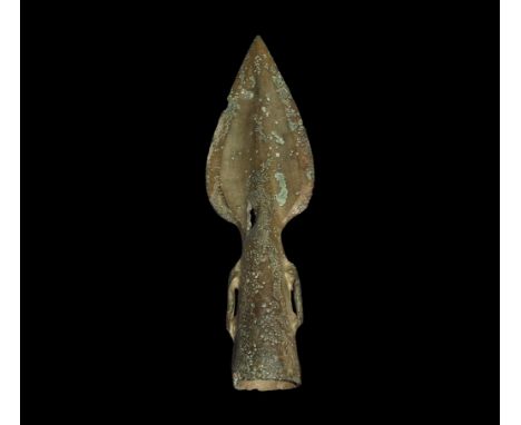 Bronze Age British Side-Looped and Socketted Spearhead 1400-1300 BC. A small leaf-shaped blade with edge bevel, tubular socke