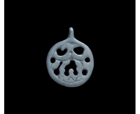 Viking Silver Openwork Pendant with Raven 11th-12th century AD. An openwork disc pendant with stylised design of addorsed rav