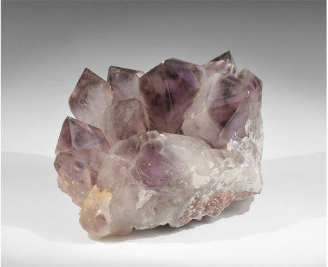 Geological Siberian Amethyst Crystal Group A fine and unusual display piece of Siberian amethyst, consisting of approximately