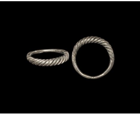 Viking Silver Twisted Ring 9th-11th century AD. A round-section expanding hoop with two rods twisted over each other, ends sc
