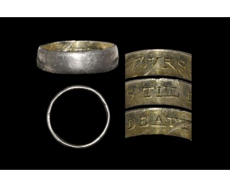 Post Medieval Silver-Gilt 'YOVRS TILL DEATH' Posy Ring 18th century AD. A flat-section hoop with incised text to the inner fa
