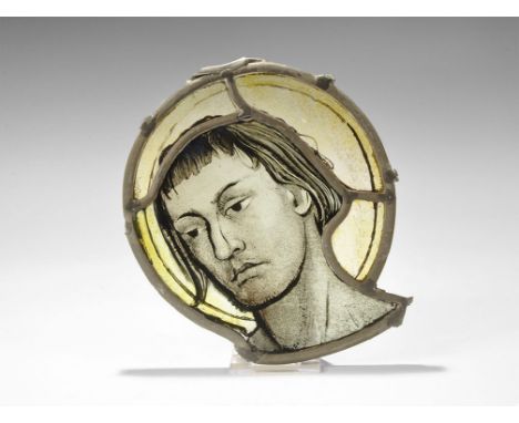 Post Medieval Leaded Window Glass with Head of a Saint 18th-19th century AD. A fragment of window glass with supporting lead 