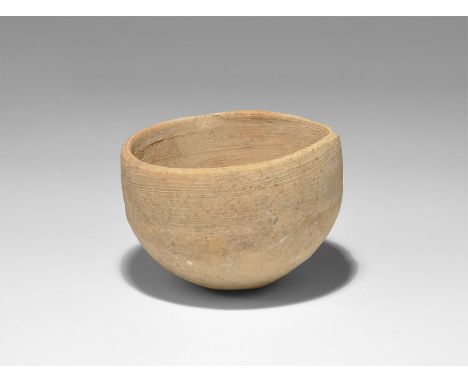 Roman Ceramic Cup 1st-3rd century AD. A hemispherical cup or crucible with band of horizontal lines to the rim. 74 grams, 77m