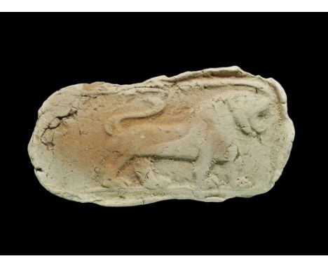 Western Asiatic Old Babylonian Terracotta Lion Moulding 20th-16th century BC. A subrectangular ceramic plaque with low-relief