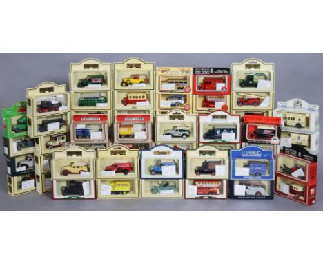 Approximately thirty various scale model vehicles by Lledo, Vanguard &amp; others, each with a window box.