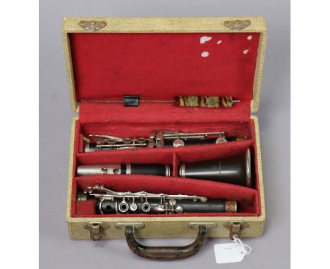 A vintage ebonised clarinet by J.R. Lafleur &amp; Son Ltd. of London with nickel plated keys, 67cm long, with a fibre-covered