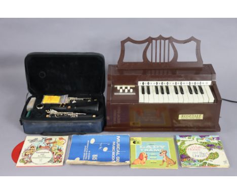 An Artemis ebonised clarinet with chrome plated keys, cased; &amp; a Rosedale “Electric chord organ”. 