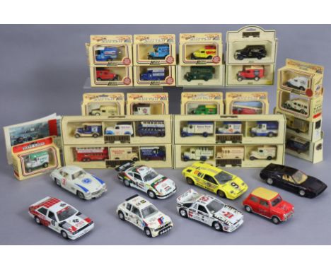 Twenty-nine Lledo “Days Gone” die-cast scale model vehicles, each with a window box; &amp; eight model sports cars, unboxed. 