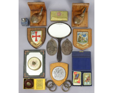 Two cast-metal oval portrait plaques “Churchill” &amp; “Nelson”, 13.5cm x 8.75cm; a pair of treen “golf club” bookends; three