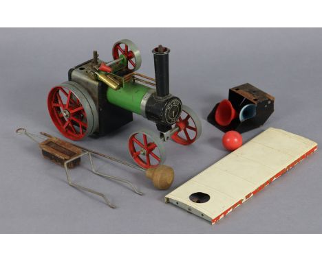 A Mamod “TE1” steam tractor, unboxed. 
