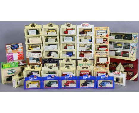 Approximately forty various scale model vehicles by Lledo &amp; others, each with a window box. 