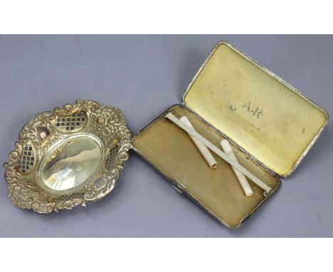 A George V silver engine-turned cigarette case, 15.5cm x 8.75cm London 1935; &amp; a modern silver oval sweetmeat dish, 15cm 