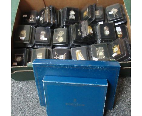 Collection of boxed novelty clocks in the form of boots, bicycles, cars, harp, etc. Together with some Worcester place mats.(