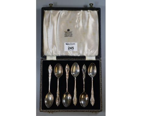 Cased set of six silver teaspoons. Birmingham hallmarks. 2.73oz troy approx. Box marked H.M The Queen Goldsmiths and Crown Je