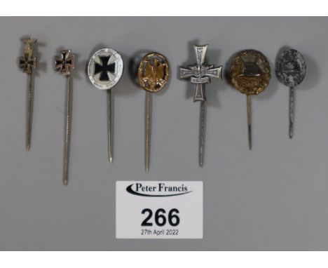 Group of German miniature and jewellery items to include stick pins for civilian dress, iron cross, WWI first class with firs