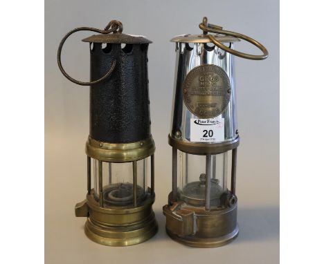 Unused Protector Lamp & Lighting co. type GR6S, miner's safety lamp, together with another appearing used miner's safety lamp