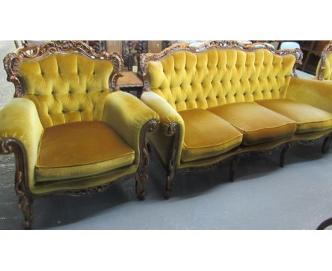 A Rococo Style mahogany 3 piece button back suite, comprising 3 seater sofa and pair of arm chairs.   (B.P. 21% + VAT) 