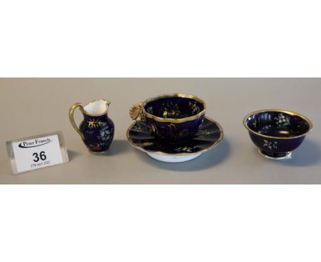 Group of Spode dark blue ground gilded and enamelled miniature items to include jug and basin marked Spode, and a cabinet cup