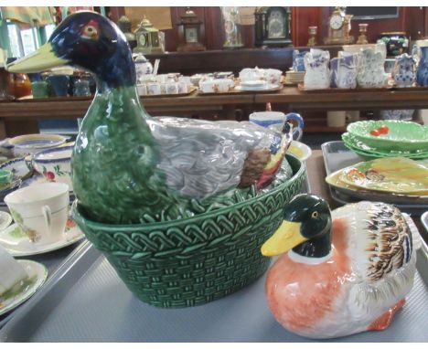 Ceramic egg crock in the form of a duck, together with another ceramic model of a duck. (2)(B.P. 21% + VAT) 