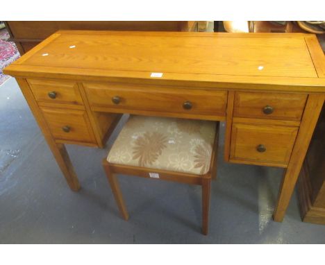 Modern ash dressing table with framed top over an arrangement of five drawers, on square legs, 118cm wide approx. Together wi