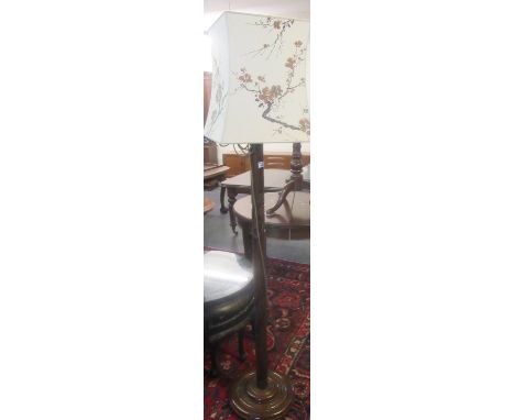 Chinese design carved hardwood standard lamp overall carved with figures in a landscape, with shade.  (B.P. 21% + VAT) 