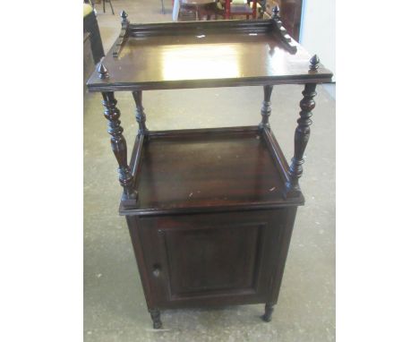 Early 20th century mahogany bedside cabinet with over shelf and baluster turned supports above panelled cupboard. 48.5cm wide