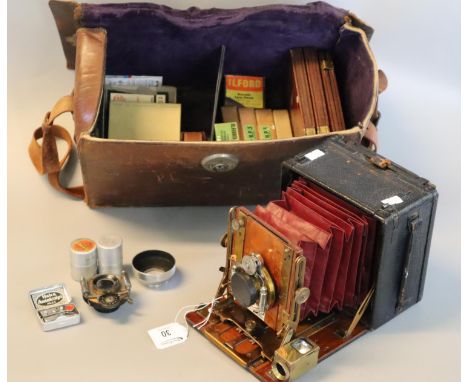 Sanderson mahogany and leather covered plate camera with a number of mahogany plates and  leather carrying case. (B.P. 21% + 