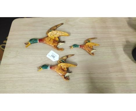 SET OF 3 VINTAGE FLYING DUCK FIGURES