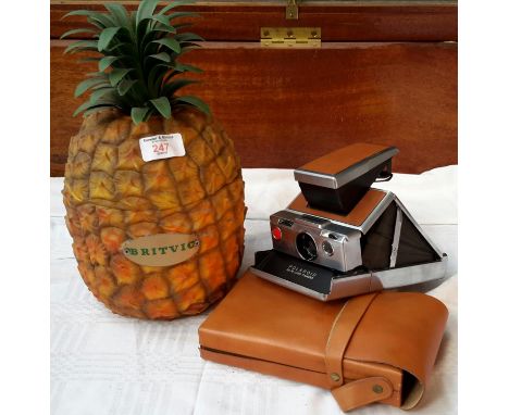 Retro Britvic pineapple ice bucket together with Polaroid SX-70 land camera & case 