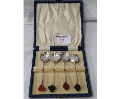 4 boxed Birmingham silver tea spoons with playing card emblems to the top