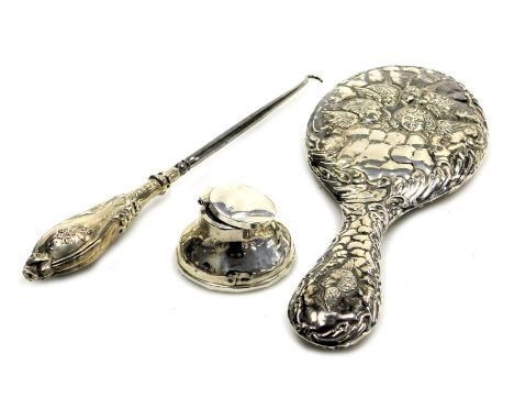 A George V silver handled button hook, with embossed floral decoration, Birmingham 1911, Edward VII silver backed hand mirror