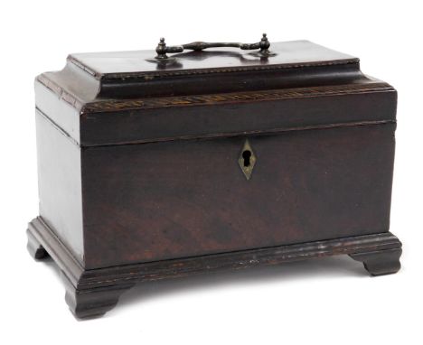 George III mahogany tea caddy, with a brass carrying handle, the hinged lid opening to reveal three recesses with metal conta