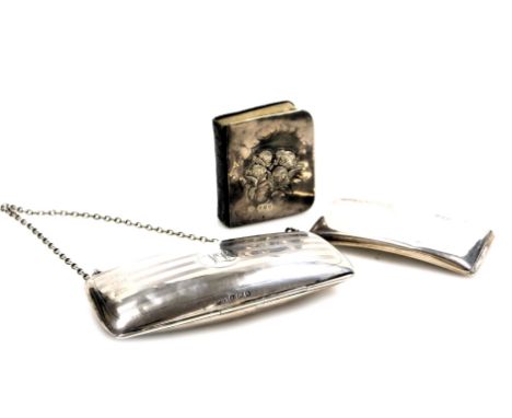 A George V silver purse, with engine turned decoration, circular reserve monogram engraved, with chain suspension, Birmingham