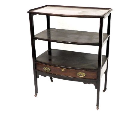 A Georgian style mahogany buffet, early 20thC, of bow fronted form, the galleried top over two shelves, with a long frieze dr