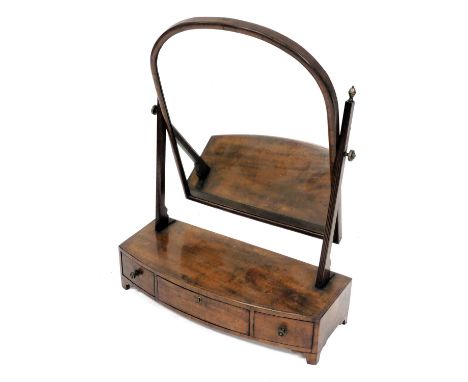 A Georgian style mahogany toilet mirror, early 20thC, with boxwood line inlay, with a domed mirror, raised on a bow fronted b